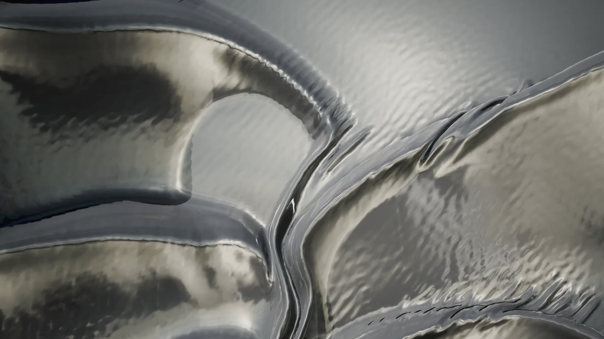 Liquid silver pewter forming waves with shimmering sunlight reflections